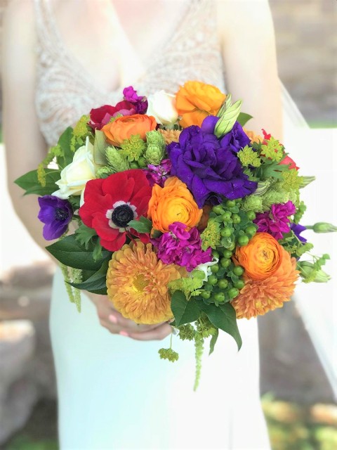 Bridal Bouquet of ranunculas, anenomes, hops, Lissyanthis, roses