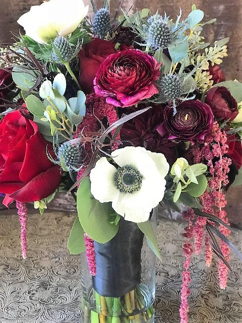 Bridal Bouquet made with anemones, peonies, burgundy hanging amaranthus