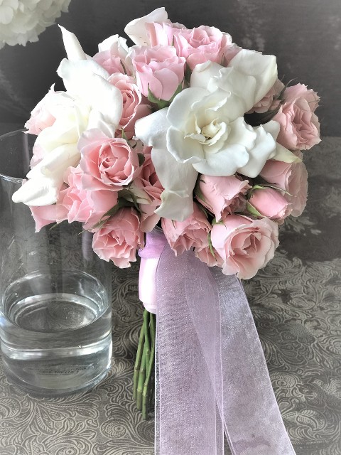 wedding bouquet of pink mini spray roses and white gardenias